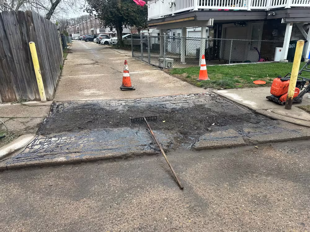 Repaired and reopened by Harrison Asphalt