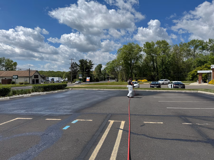Sealcoating a striped parking lot
