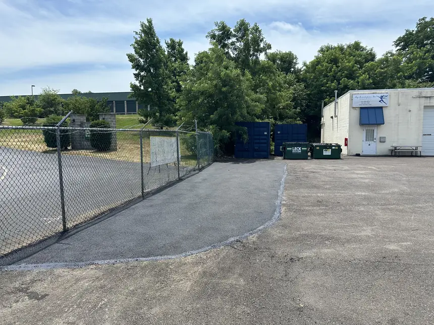 Finished asphalt apron at a service yard